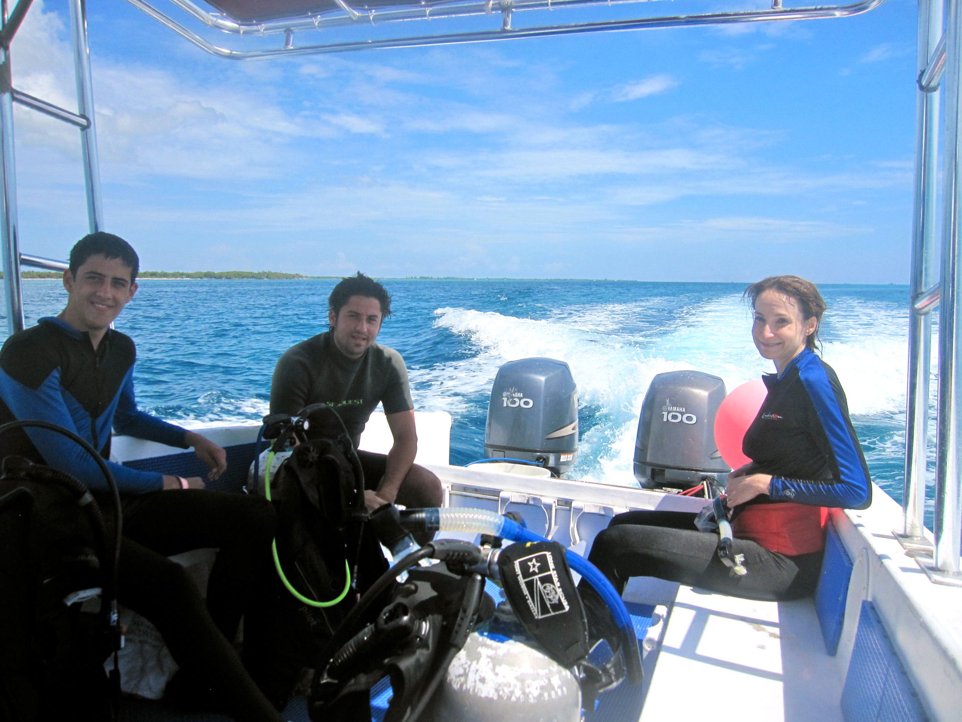 Divers on a boat heading out in Cozumel